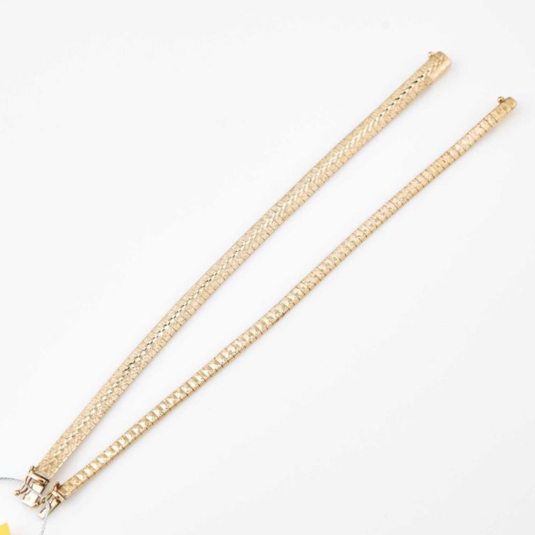 14k two gold flexible bracelets