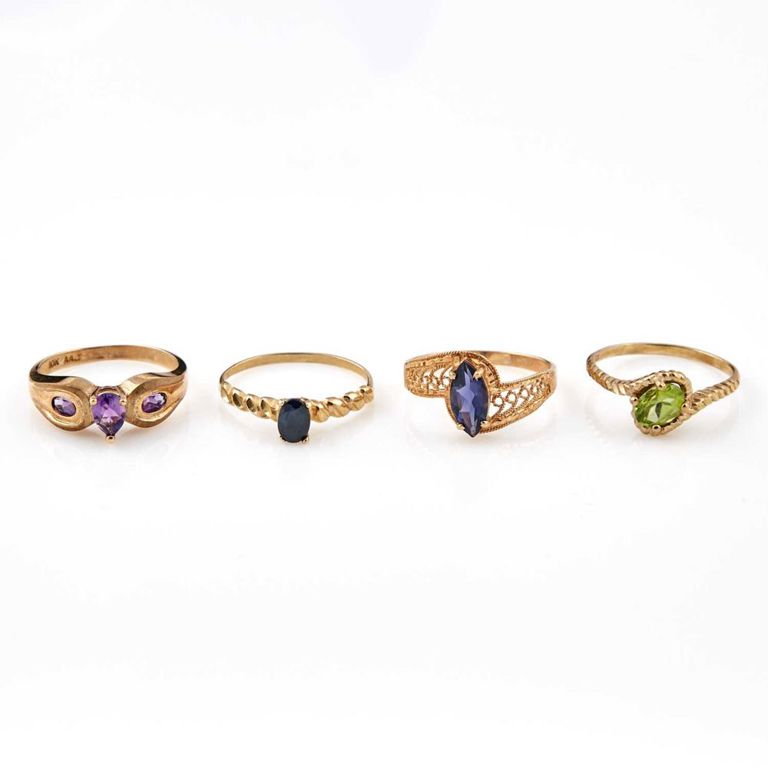 Four 10k gold stone rings