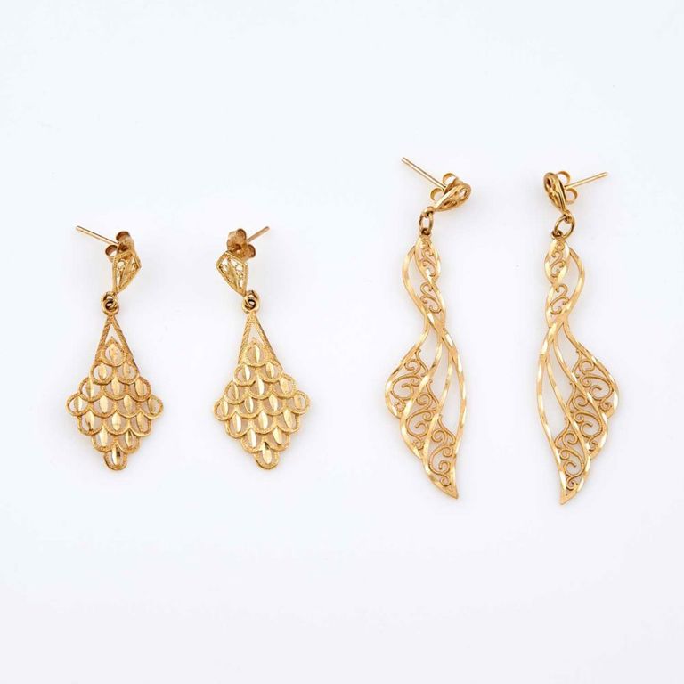 Four 14k and 10k gold earrings