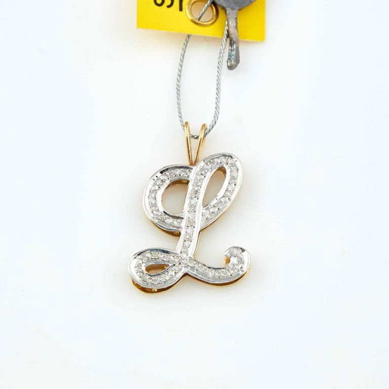14k gold pendant with diamond