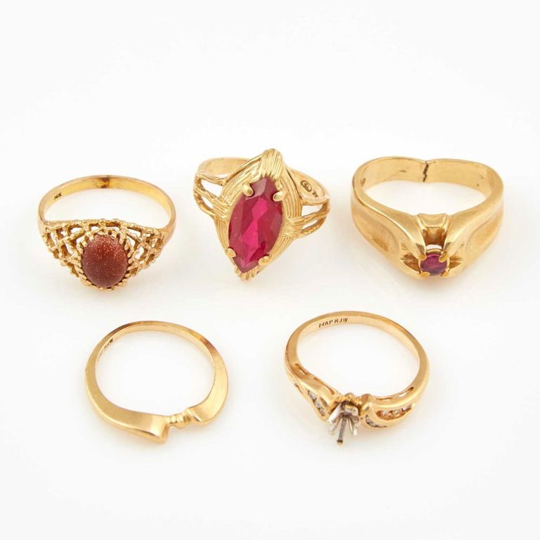 14k gold diamond ring with four additional rings
