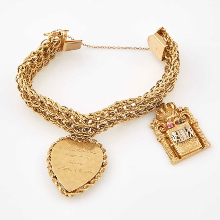 14k gold charm bracelet with stone and bead charms