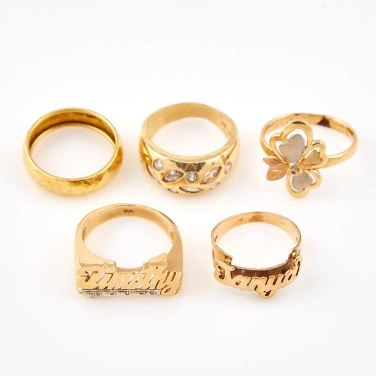 Diamond name ring and four gold and stone rings