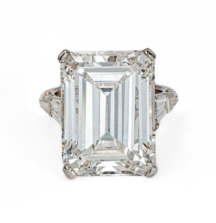 Platinum ring with emerald cut diamond