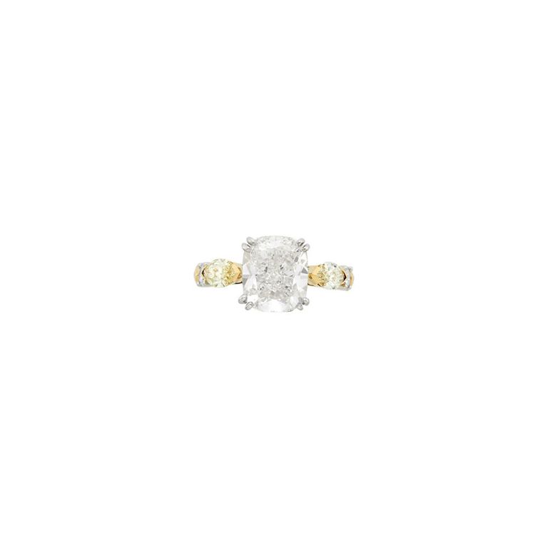 Gold and platinum ring with diamond and colored diamond