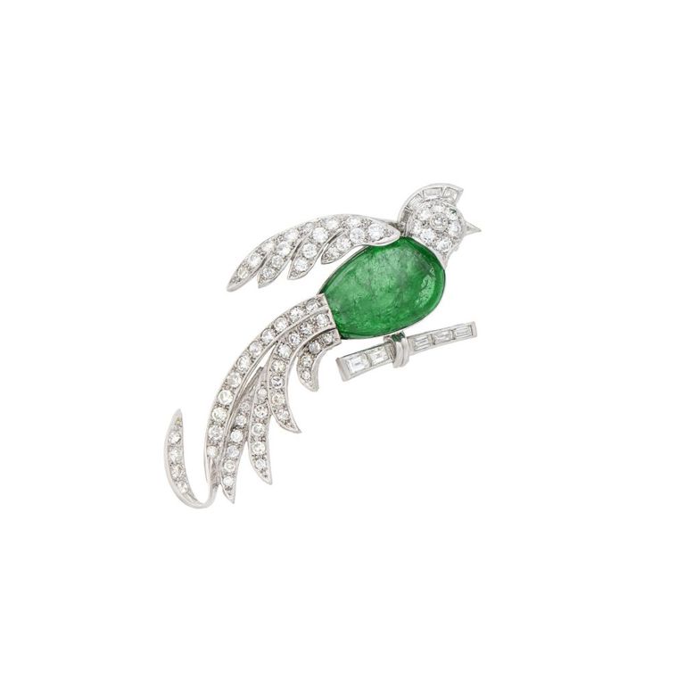 Platinum bird clip with emerald and diamond