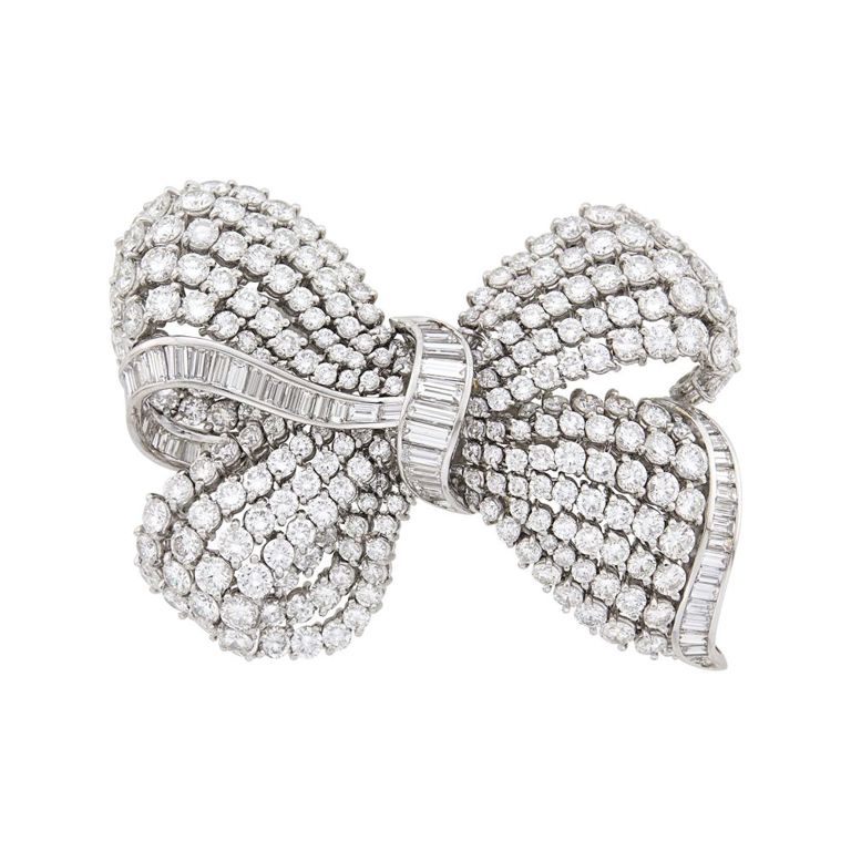 Platinum bow brooch with diamond