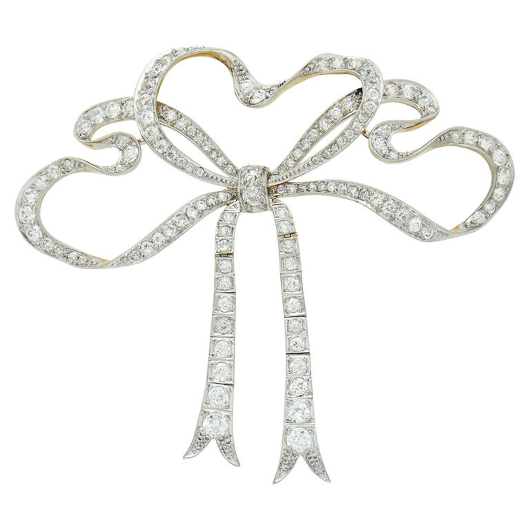 Platinum gold diamond bow brooch
