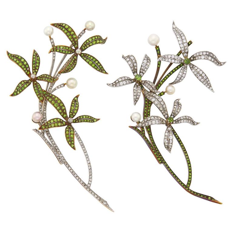 Pair of platinum gold diamond demantoid garnet and pearl floral brooches