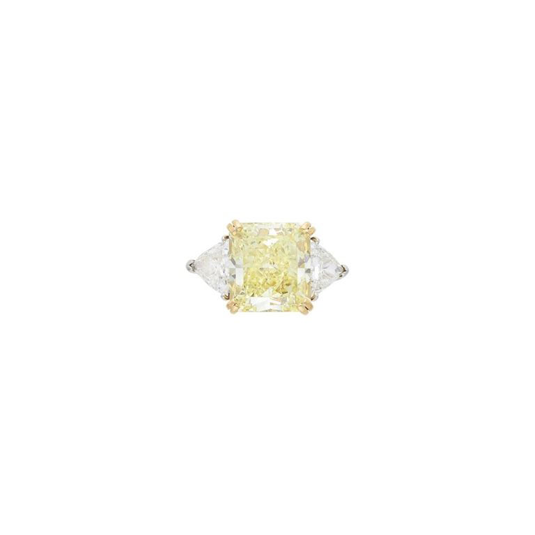 Platinum gold fancy yellow diamond ring