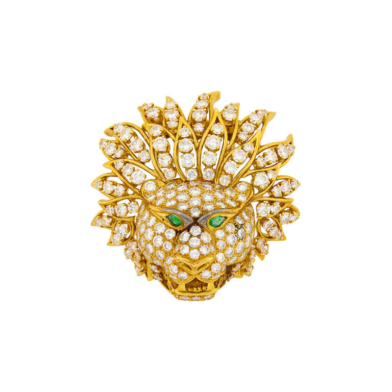 18k gold lion head clip-brooch with diamond and emerald