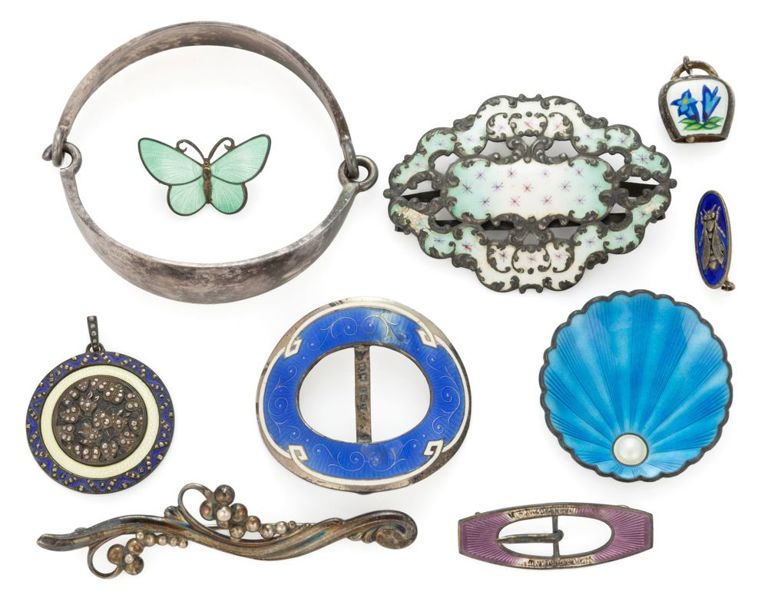 Lot of ten Georg Jensen and other sterling and silver jewelry