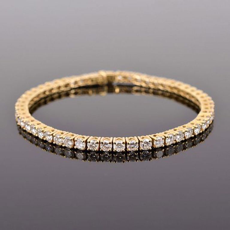 18k gold and diamond estate tennis bracelet
