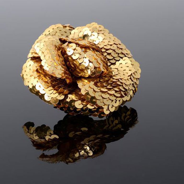 Chanel camellia gold sequin brooch