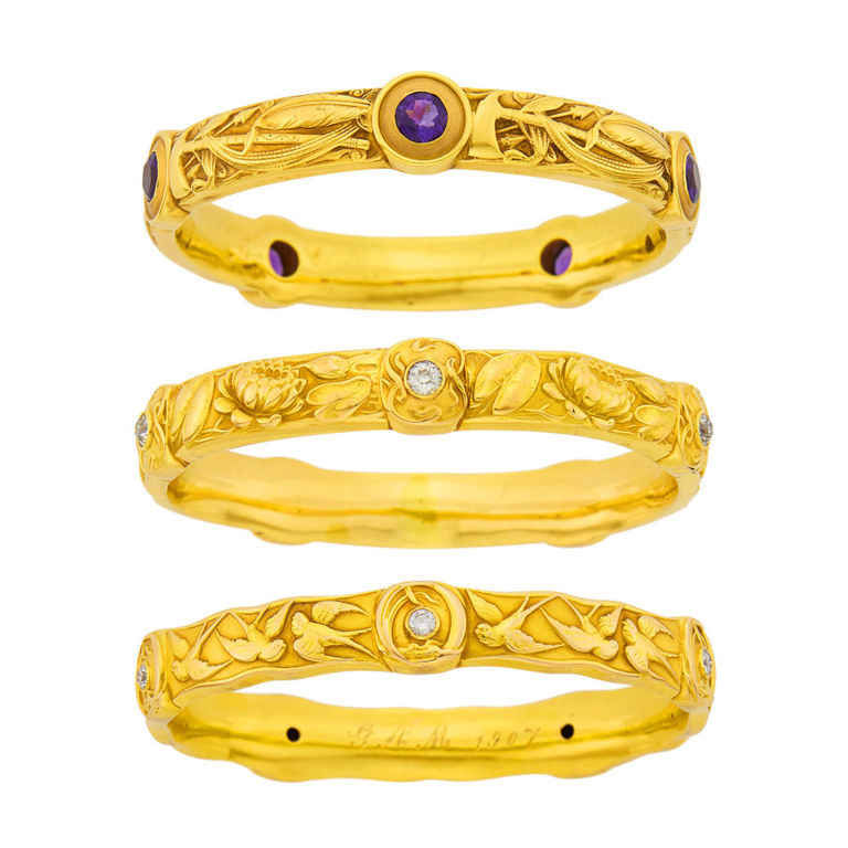 Three antique gold and gem-set bangle bracelets
