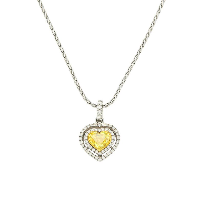 White gold, fancy vivid yellow diamond and diamond heart pendant with chain necklace