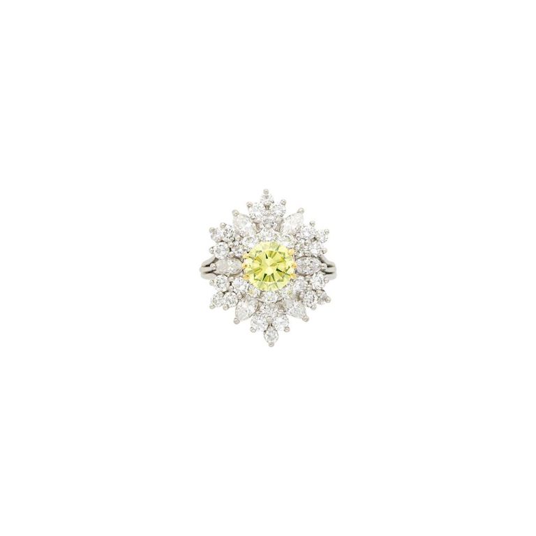 Platinum, fancy intense greenish yellow diamond and diamond ring