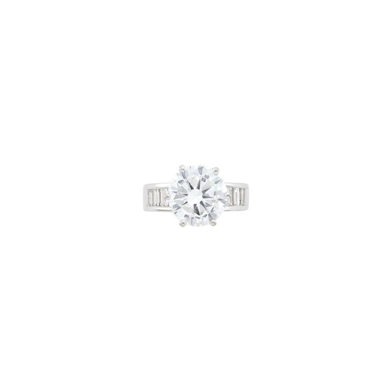 White gold and laser-drilled diamond ring