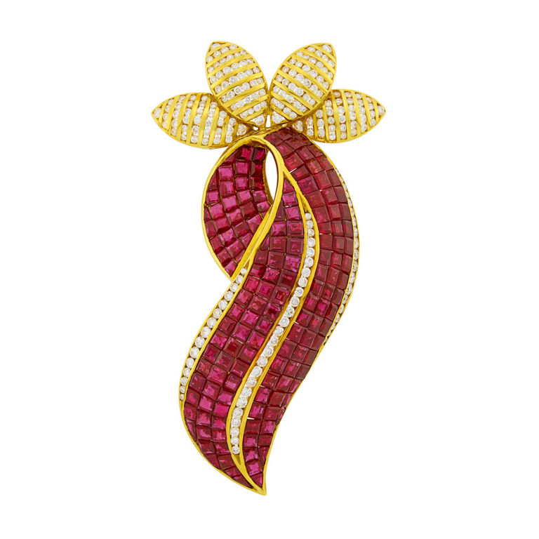 Gold, invisibly-set ruby and diamond clip-brooch