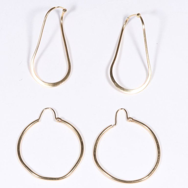 Two pairs of 14k gold hoop earrings