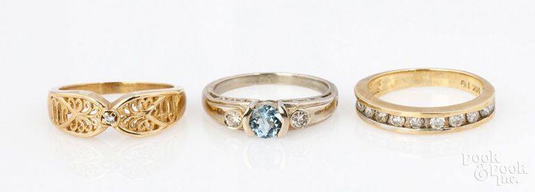 Three 14k yellow gold rings