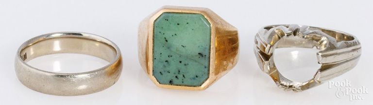 18k yellow gold green stone ring and two 14k gold rings