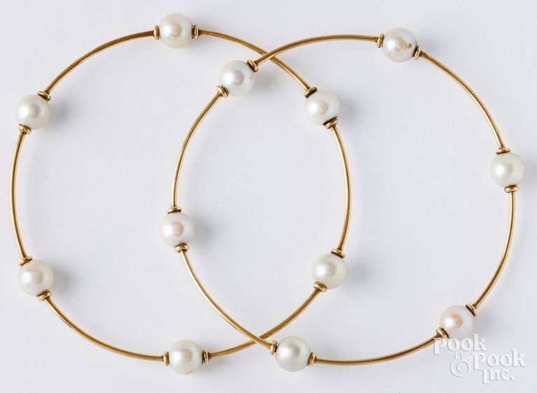 Two 18k yellow gold cultured pearl bracelets