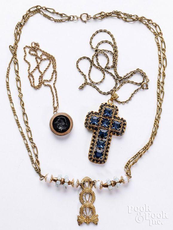 Three gold-plated pendant necklaces