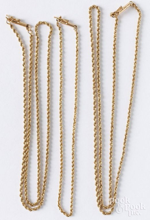 Two 14k yellow gold necklaces and 14k yellow gold bracelet