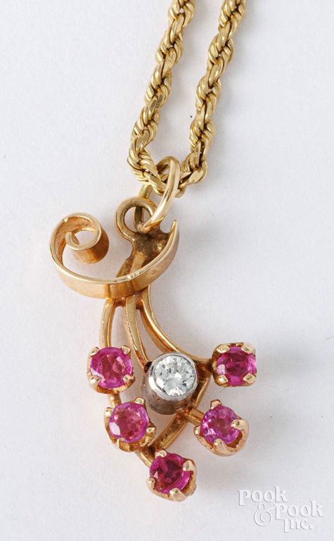 14k yellow gold diamond and ruby pendant on necklace