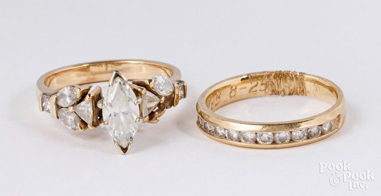 Two 14k yellow gold diamond rings