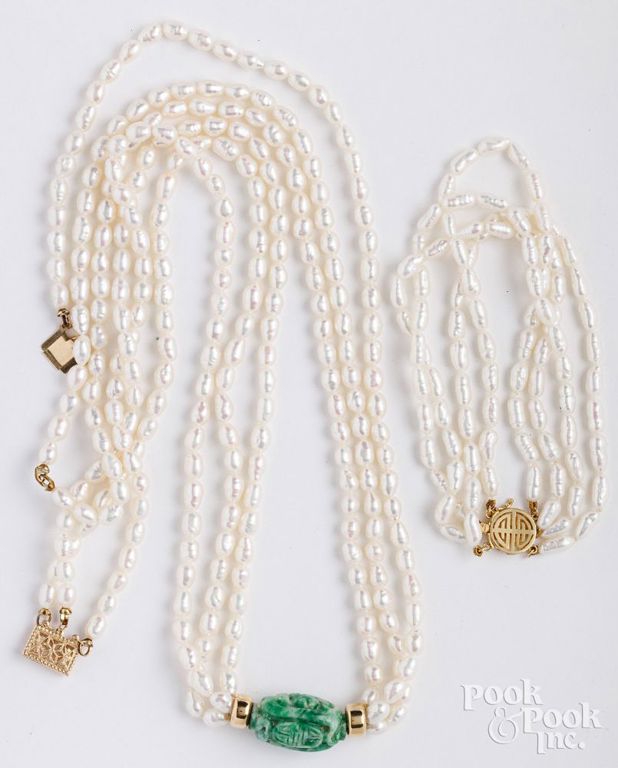 Two 14k gold pearl necklaces