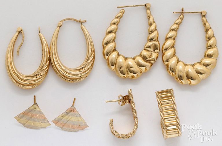 Four pairs of 14k yellow gold earrings