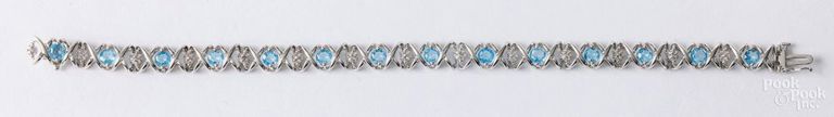10k white gold blue topaz bracelet