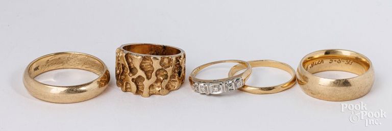 Five 14k yellow gold rings
