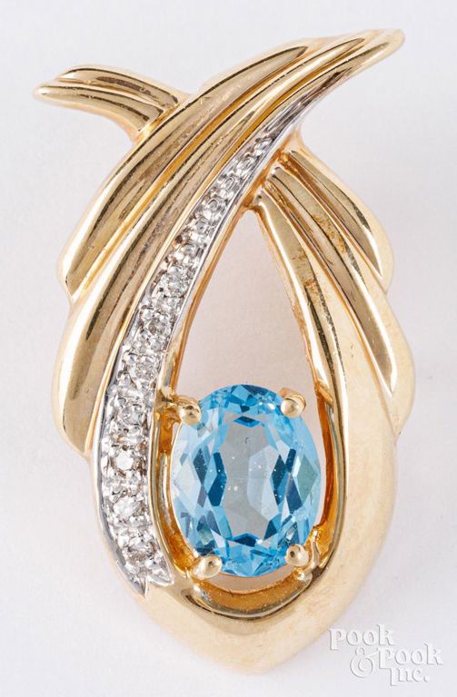 14k yellow gold blue topaz and diamond pendant