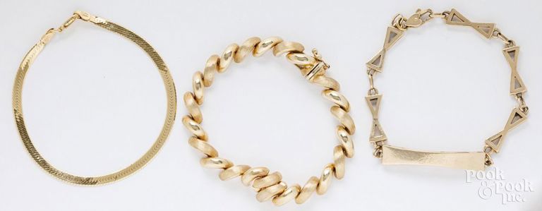 Three 14k yellow gold bracelets