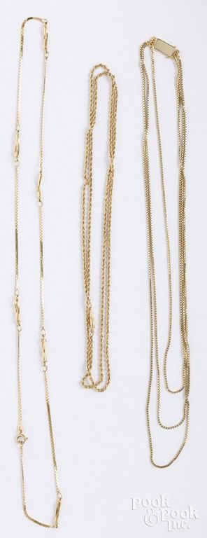 Three 14k yellow gold chain necklaces