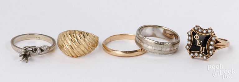 Four 14k gold diamond rings, and 10k gold enamel and pearl ring