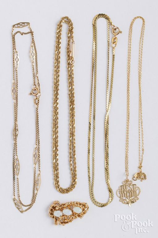 Four 14k yellow gold necklaces and opal pendant
