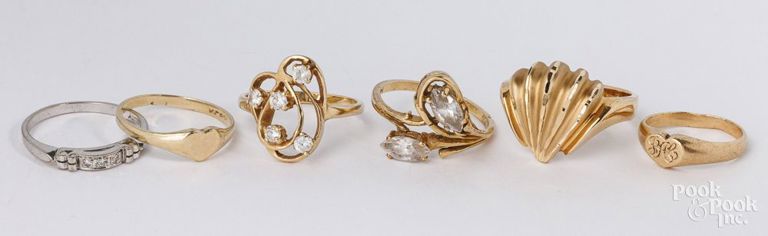 Five 14k gold rings with white gold ring with diamonds