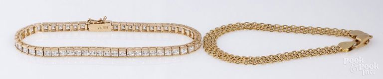 Two 14k yellow gold bracelets