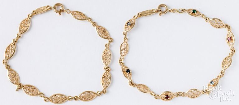 Two 14k yellow gold bracelets