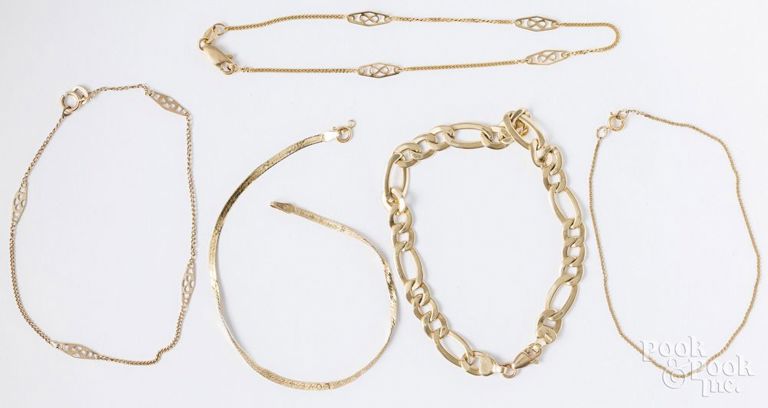 Five 14k yellow gold bracelets