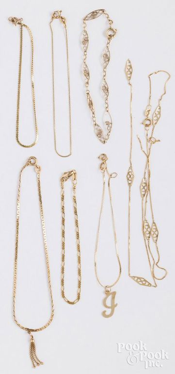 Seven 14k yellow gold bracelets