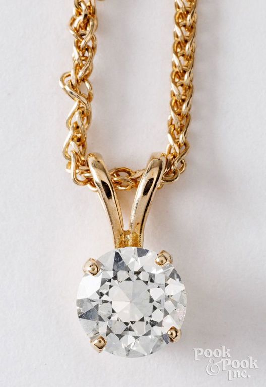 14k yellow gold necklace with round diamond pendant