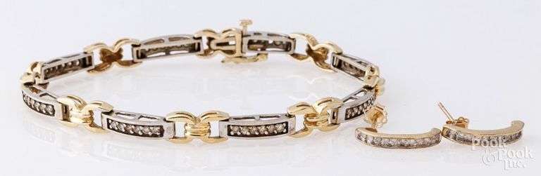 14k gold diamond bracelet and 10k gold diamond earrings