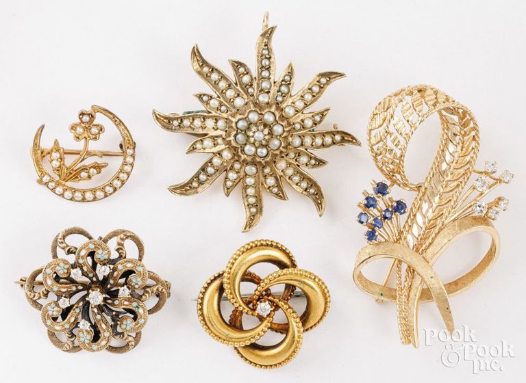 Five brooches