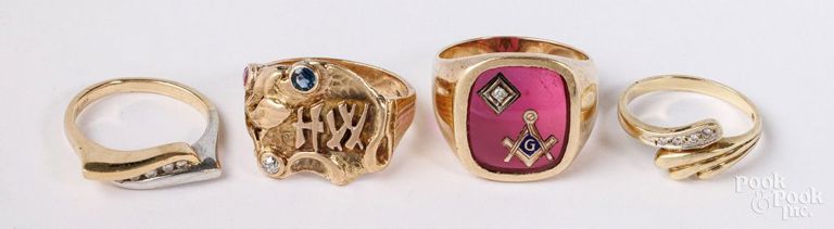 Two 14k yellow gold rings and two 10k yellow gold rings