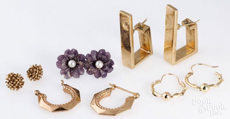 Five pairs of 14k gold earrings